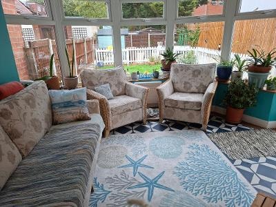 Bright conservatory breakfast room at La Belle Maison